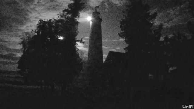 View looking south of the St. Helena Lighthouse and Lake Michigan beyond. // Image captured at: 2026-08-23 02:36:03 UTC (about 1 min. prior to this post) // Image sourced from: gllka.org // Current Temp in St. Helena Island: 63 F | 17 C // Precip: few clouds // Wind: NW at 14 mph | 22 kph // Humidity: 77%